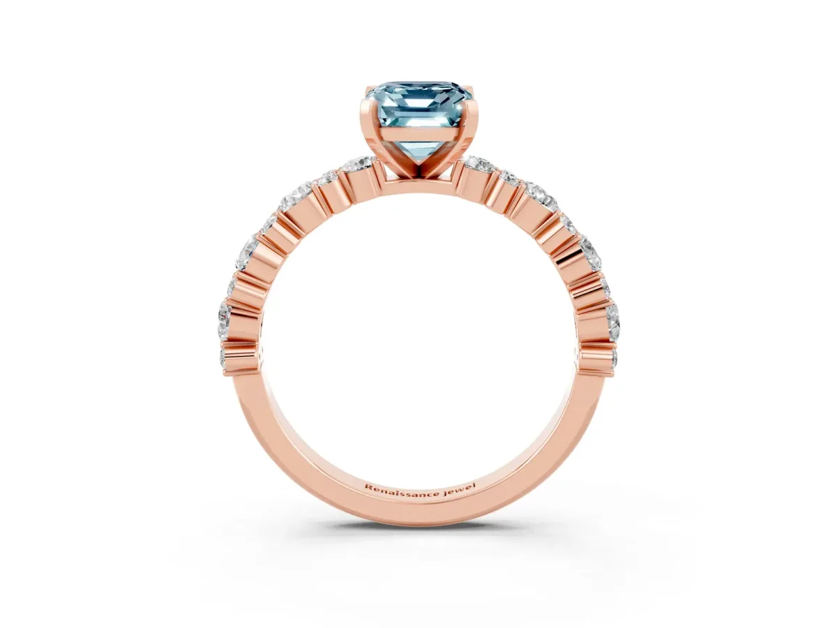 Emerald Cut Aquamarine Side Stone Solitaire Ring with Round and Four-Prong Setting Rose gold