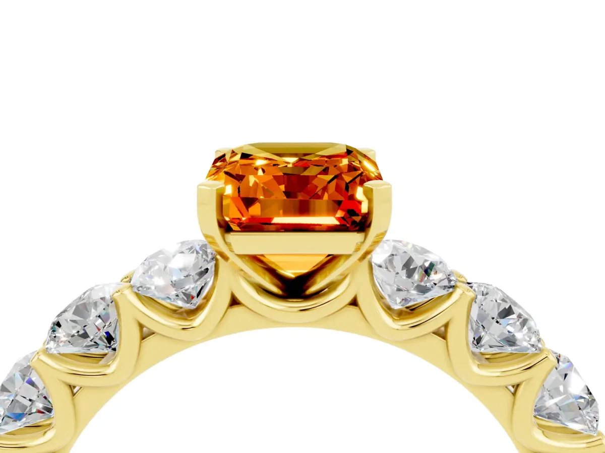 Emerald Cut Citrine Prong Setting with Side Stones on a Pave Band Yellow gold