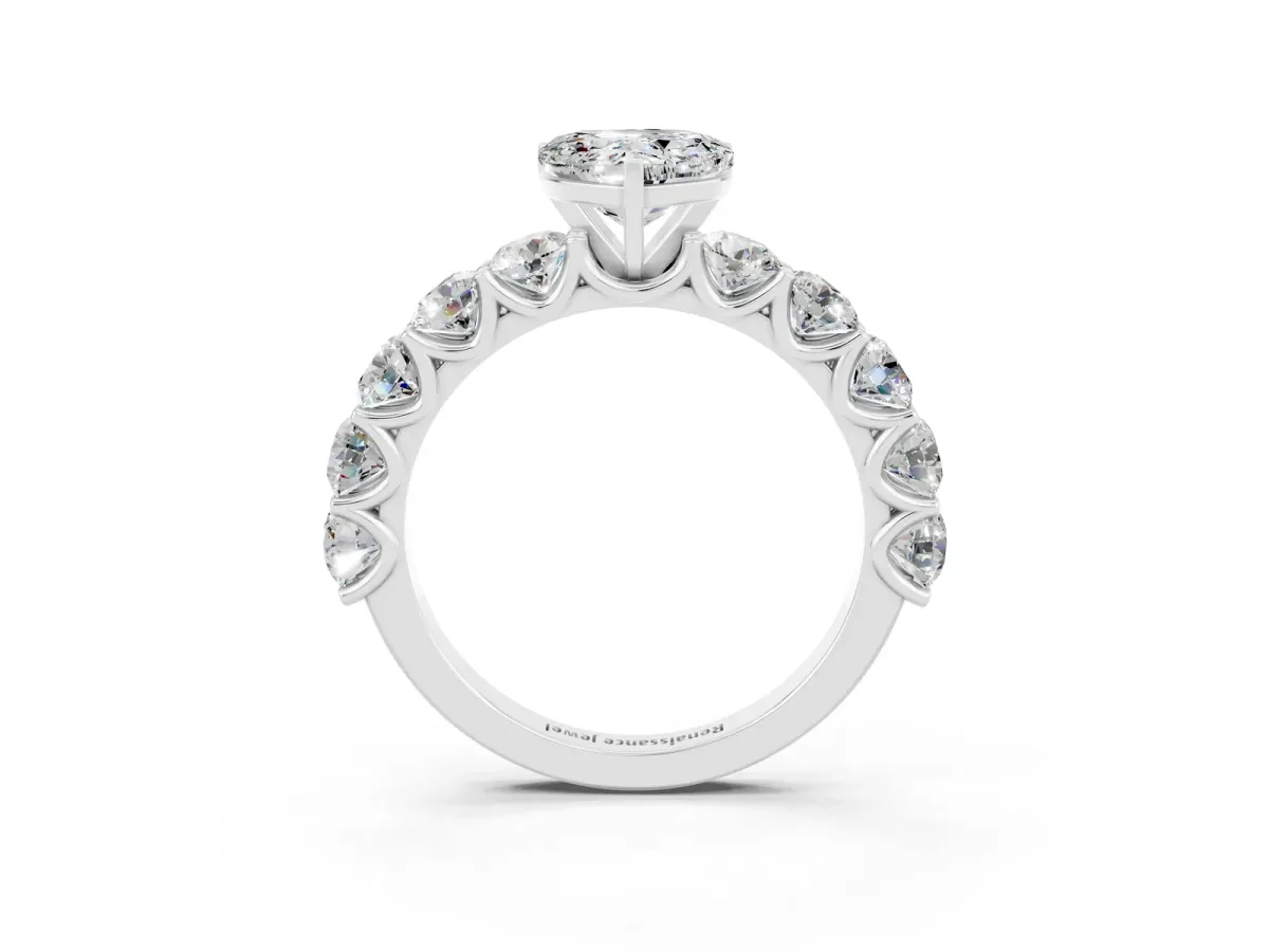 Heart Cut Moissanite Prong Setting with Side Stones on a Pave Band Silver