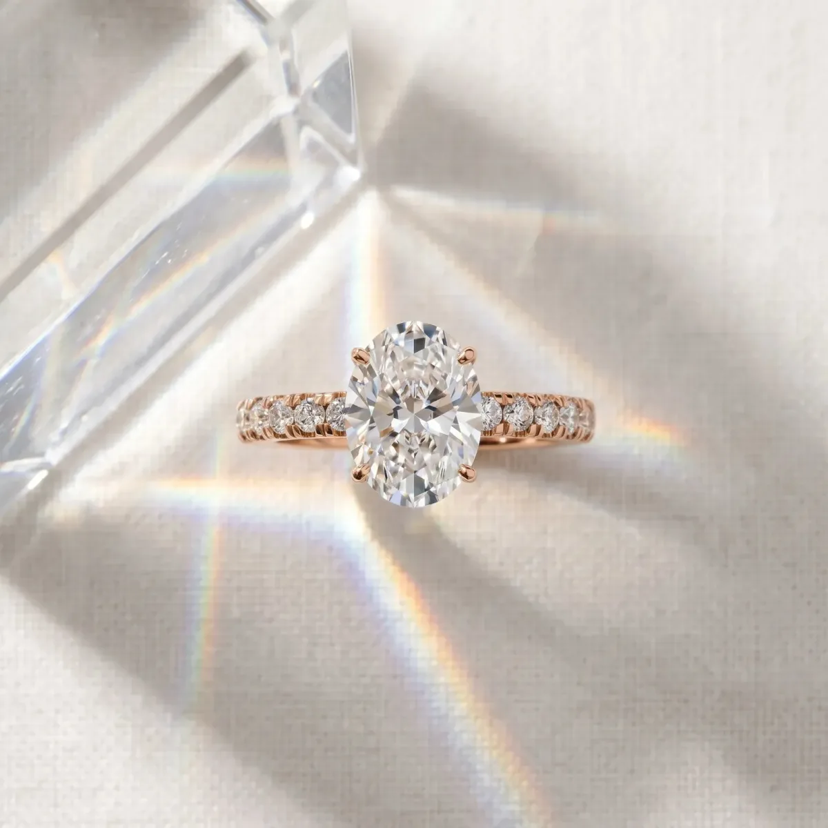 Oval Cut Diamond Pave Band Solitaire Ring with Round and Prong Setting Rose gold