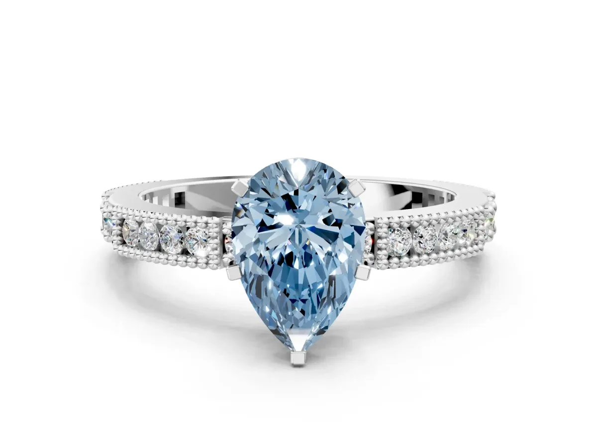 Fancy Blue Pear Cut Solitaire with Pavé Band and Four-Prong Setting Platinum