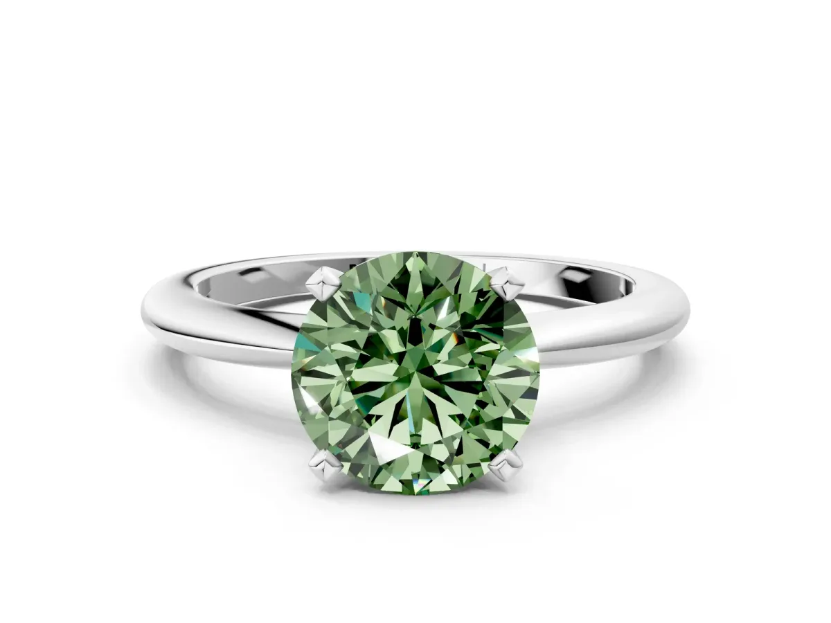 Fancy Green Round Cut Diamond Solitaire Ring with Six-Prong Setting and Classic Band Silver