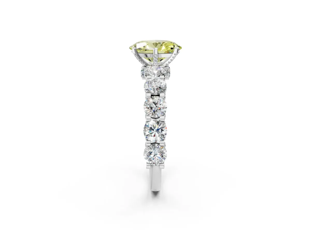 Fancy Yellow Oval Cut Diamond Side Stone Engagement Ring with Four-Prong Setting Platinum