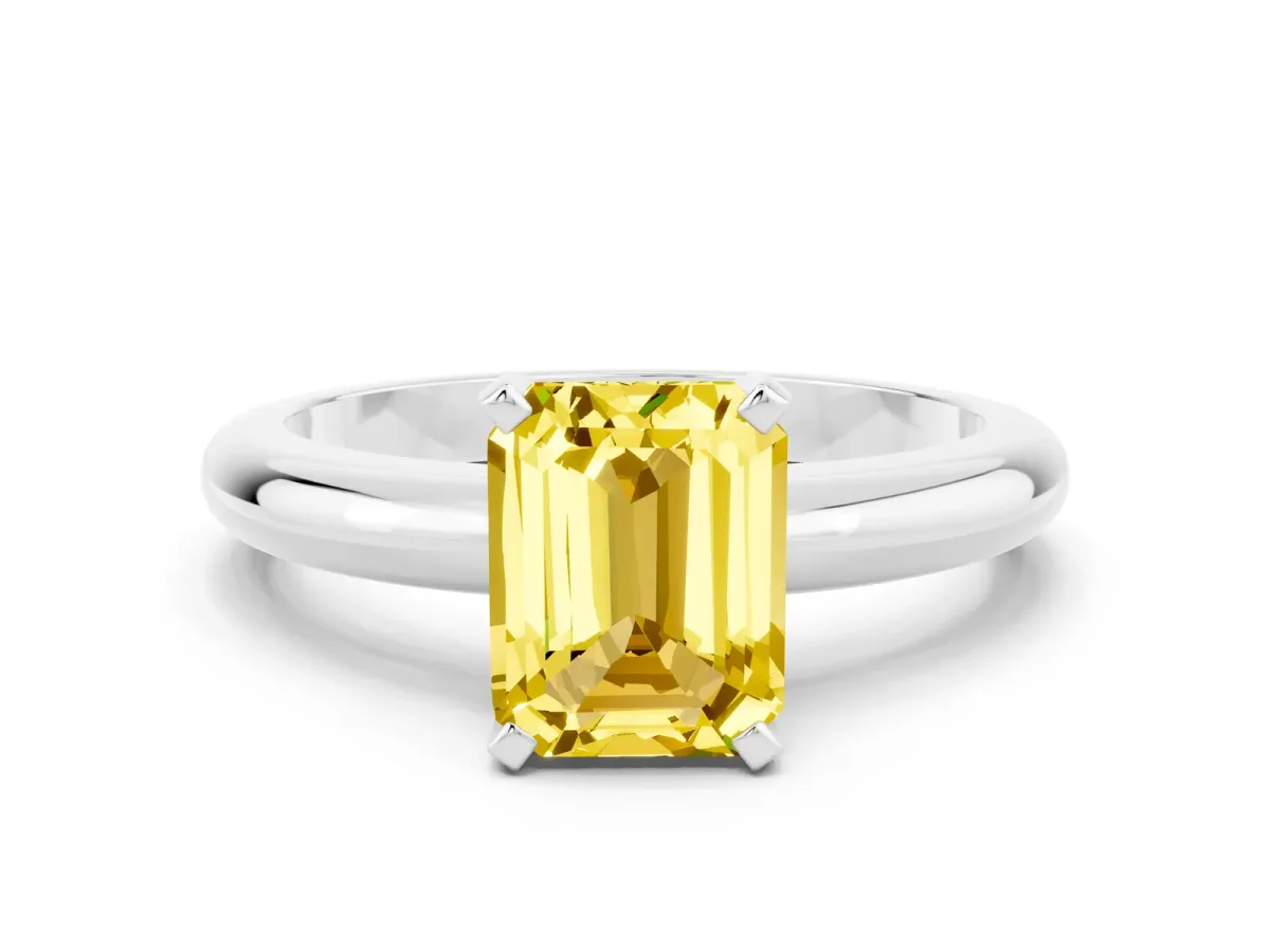 Emerald Cut Yellow Sapphire Solitaire Engagement Ring with Round Band and Four-Prong Setting Silver