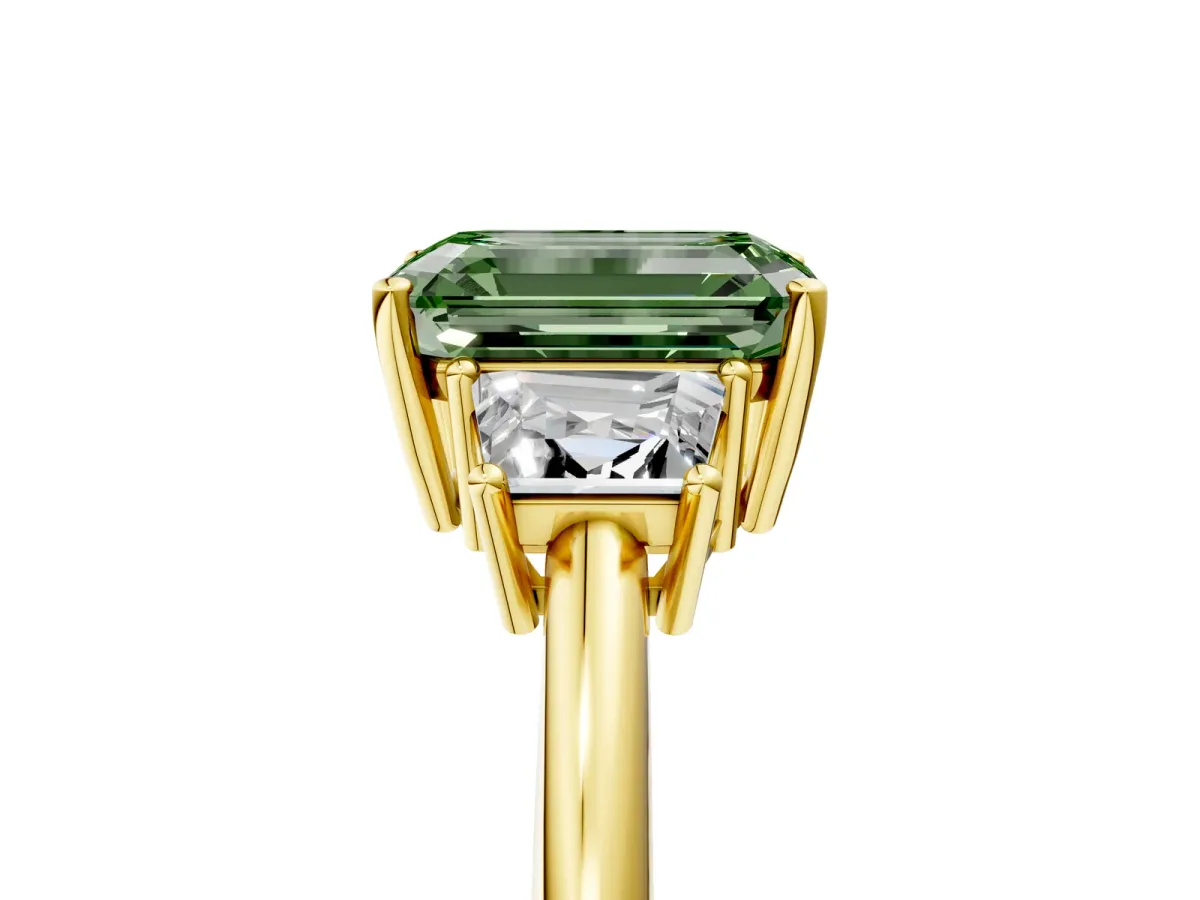 Fancy Green Emerald Cut Diamond Three-Stone Ring with Trapezoid Side Stones and Prong Setting Yellow gold