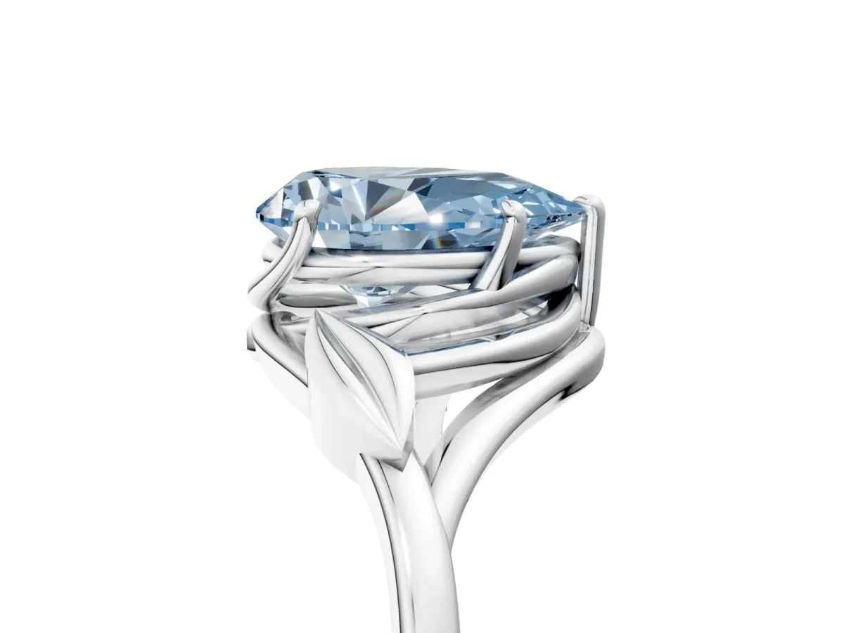 Fancy Blue Pear Cut Diamond Solitaire Ring with Twist Band and Four-Prong Setting Platinum
