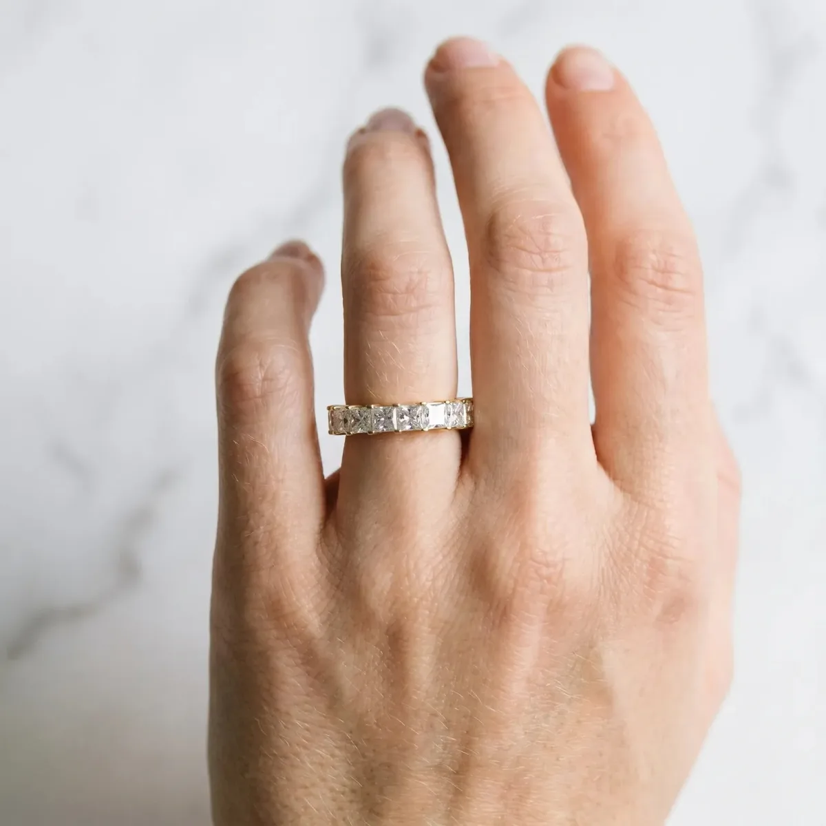 Princess Cut Diamond Eternity Band with Channel Setting and Shared Prong Yellow gold