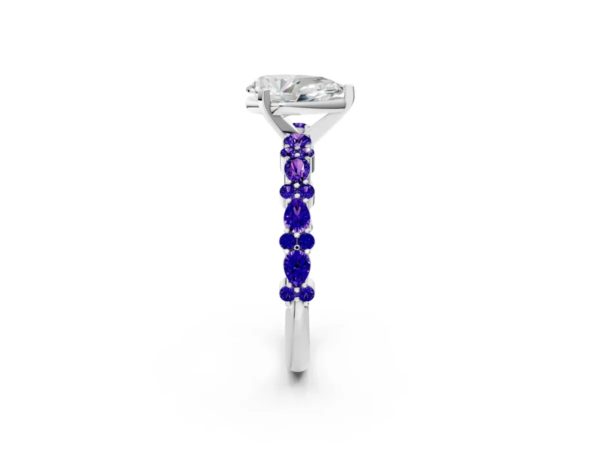 Pear Cut Diamond Side Stone Solitaire Ring with Round Tanzanite and Four-Prong Setting Silver