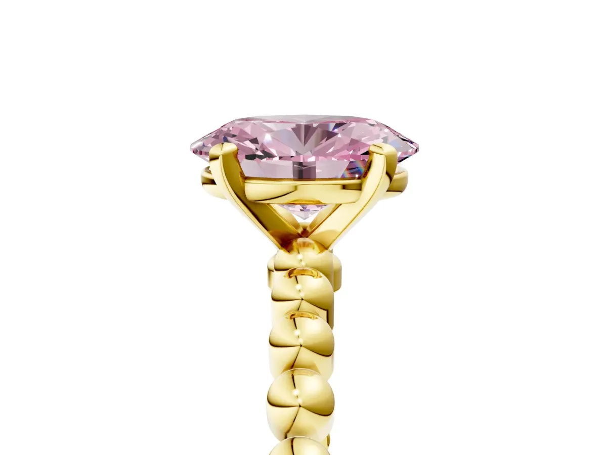 Fancy Pink Oval Cut Diamond Solitaire Ring with Beaded Band and Prong Setting Yellow gold