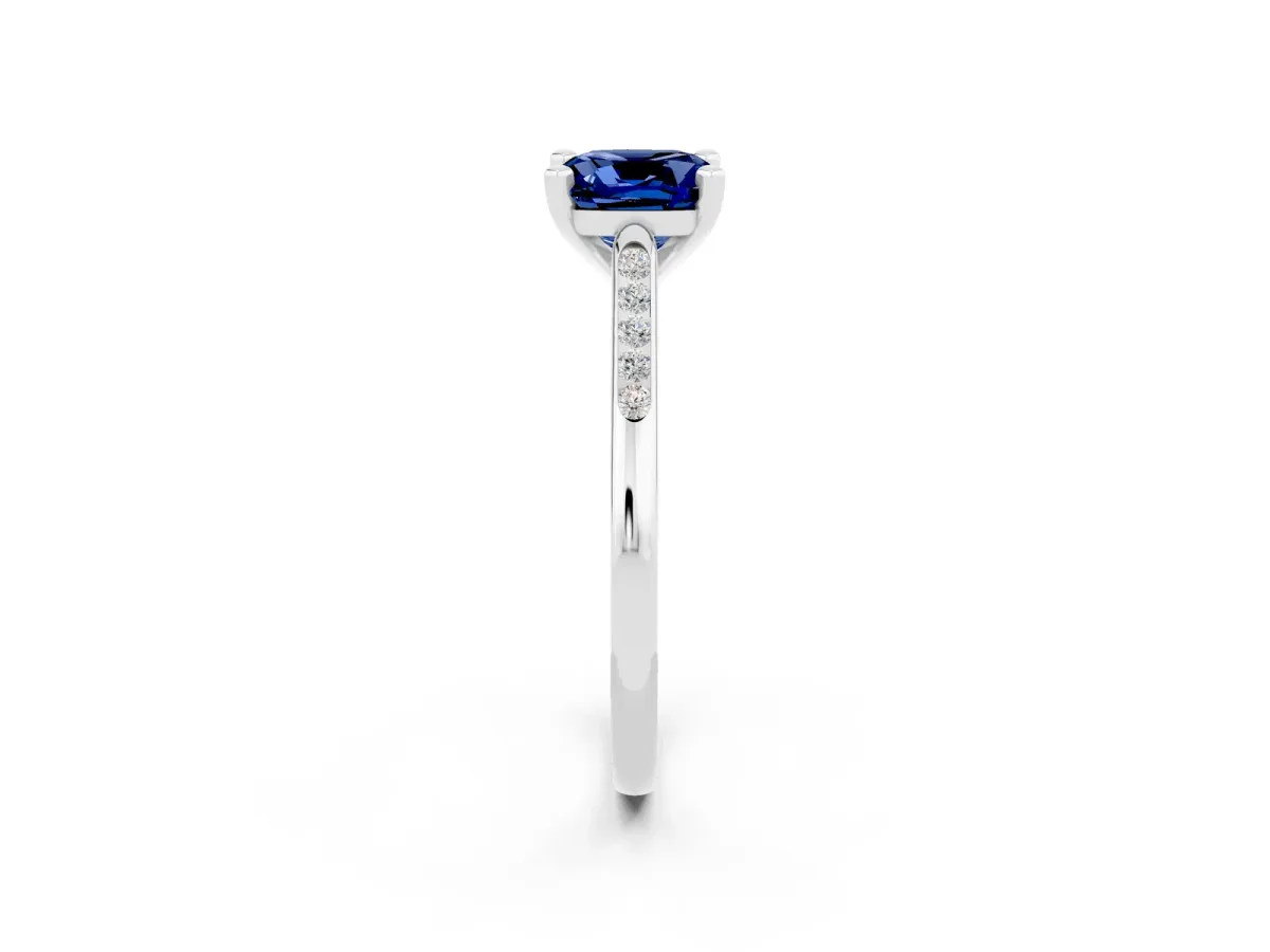 Cushion Cut Blue Sapphire Solitaire Ring with Channel Set Round Band and Prong Setting Silver