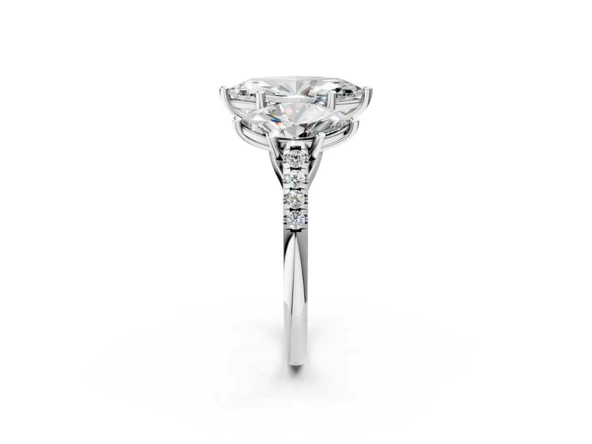 Three-Stone Marquise Cut Diamond Ring with Round Pavé Band and Prong Setting Platinum