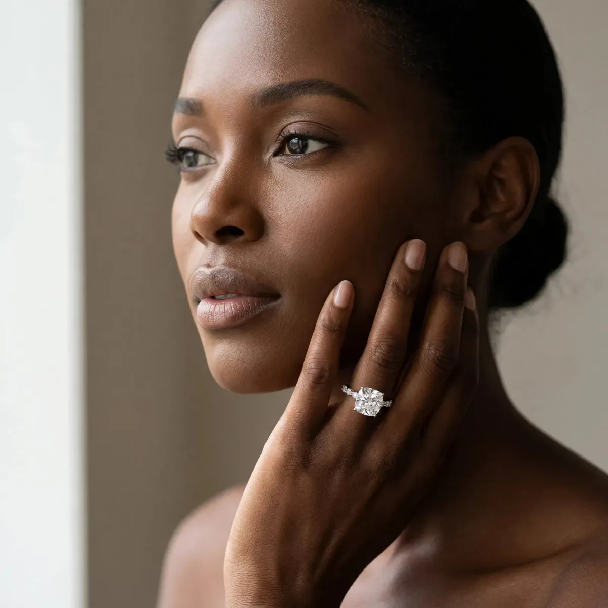 Cushion Cut Diamond Ring with Marquise and Round Side Stones and Four-Prong Setting Silver