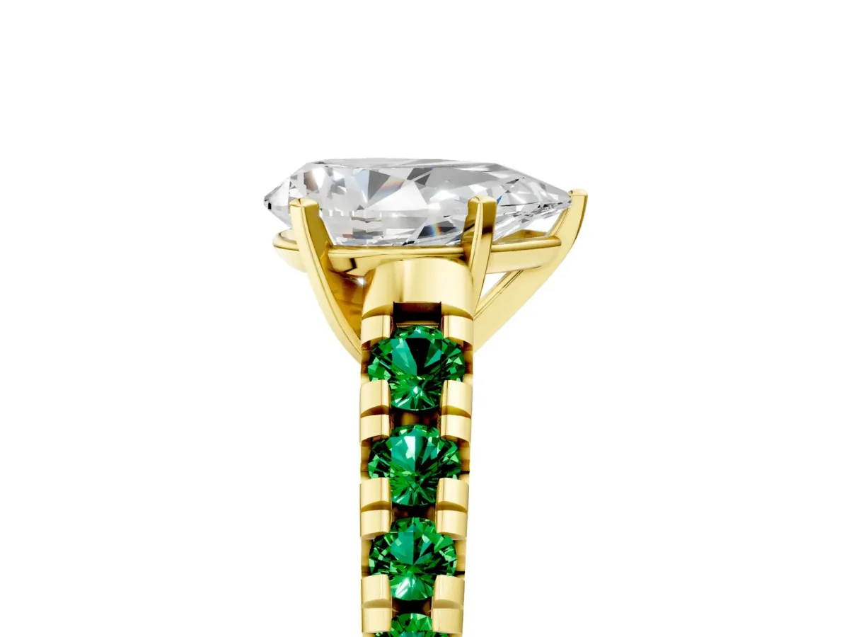 Pear Cut Diamond Cathedral Solitaire Ring with Round Emerald Pavé Band Yellow gold