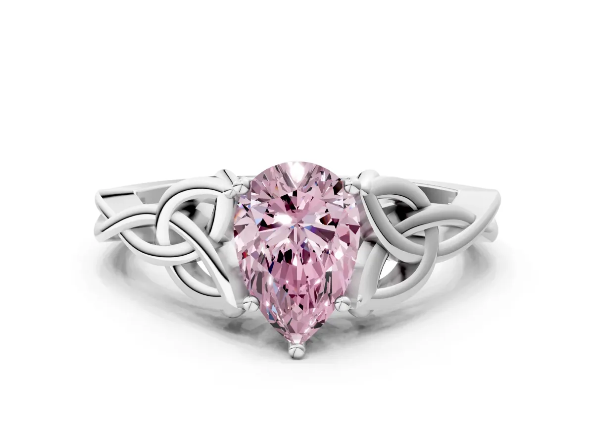 Fancy Pink Pear Cut Diamond Solitaire Engagement Ring with Celtic Knot Band and Four-Prong Setting Silver