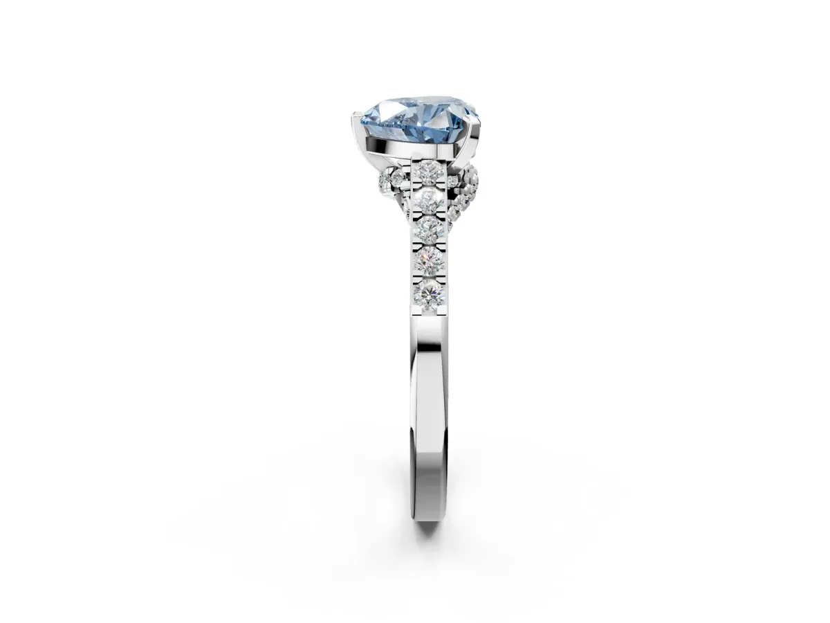 Fancy Blue Heart Cut Diamond Solitaire Ring with Crossover Gallery and Round Pavé Band Silver