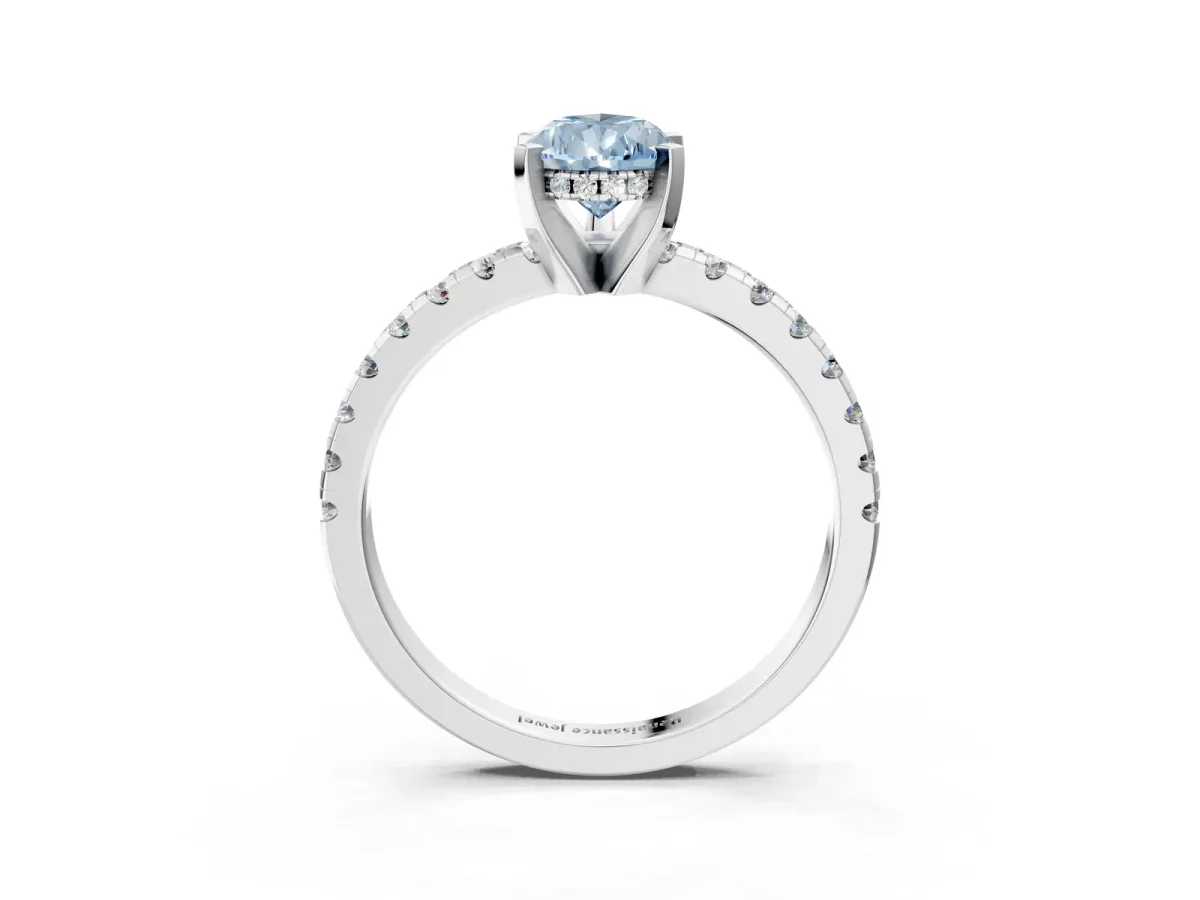 Fancy Blue Pear Cut Diamond Solitaire Ring with Round Pavé Band and Four-Prong Setting Silver