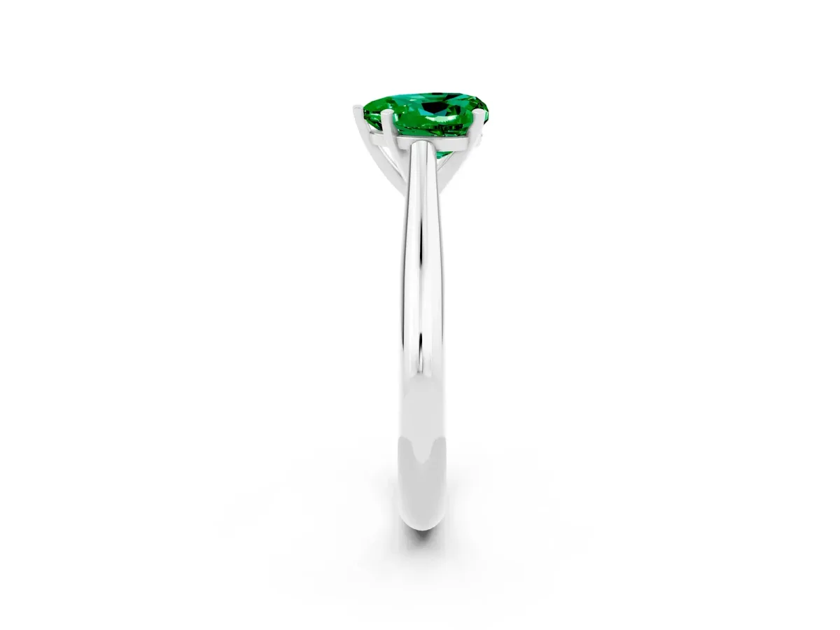 Heart Cut Emerald Solitaire Engagement Ring with Cathedral Setting and Four-Prong Mount White gold
