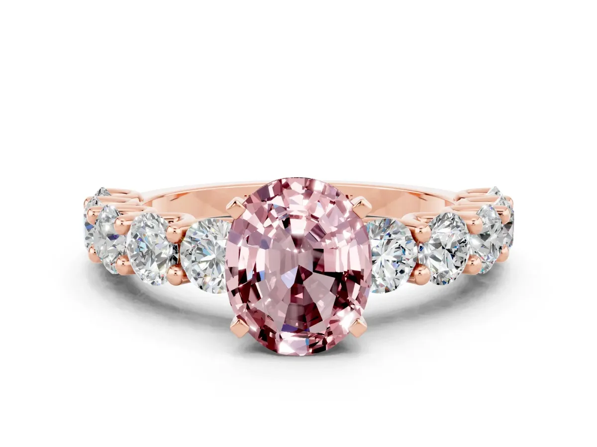 Oval Cut Morganite Prong Setting with Side Stones on a Pave Band Rose gold
