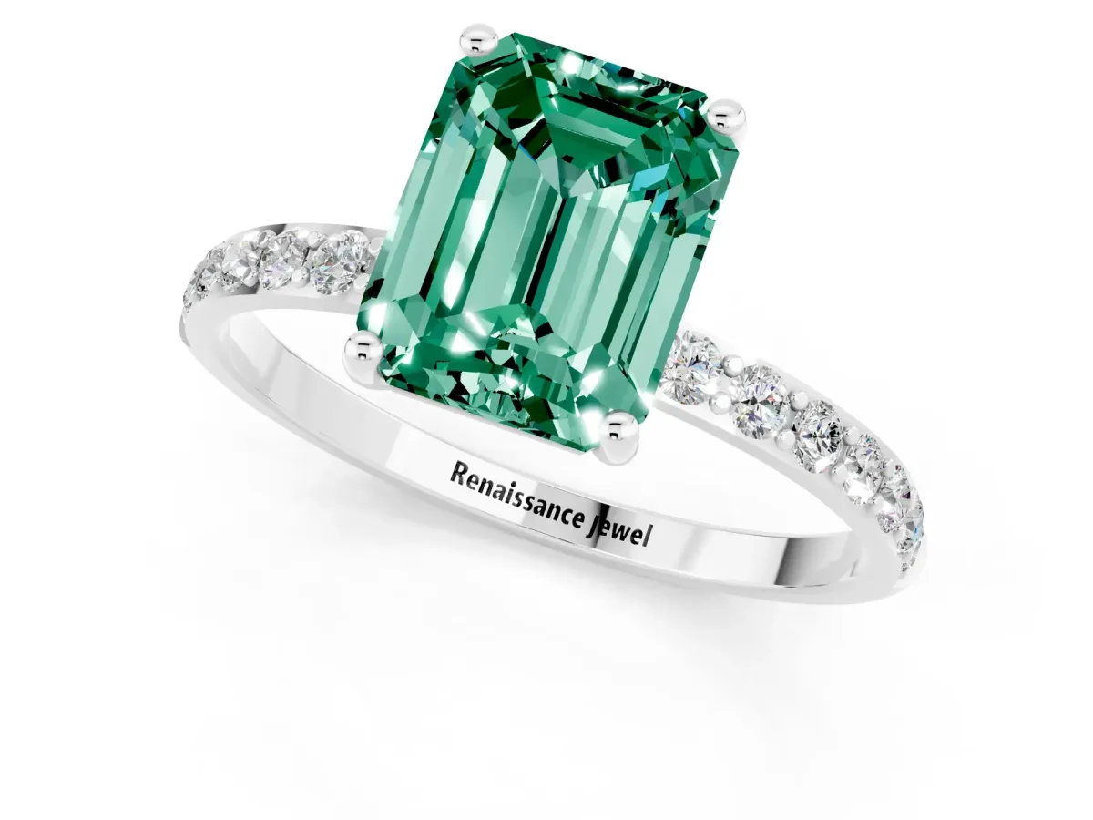Emerald Cut Green Sapphire Solitaire Ring with Round Pavé Shoulders and Prong Setting Silver