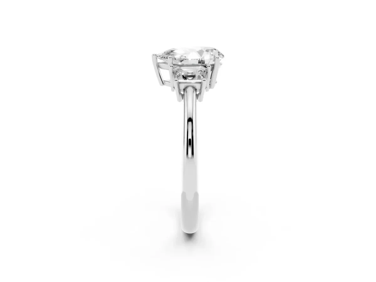 Pear Cut Diamond Three-Stone Ring with Trapezoid Side Stones and Prong Setting Platinum