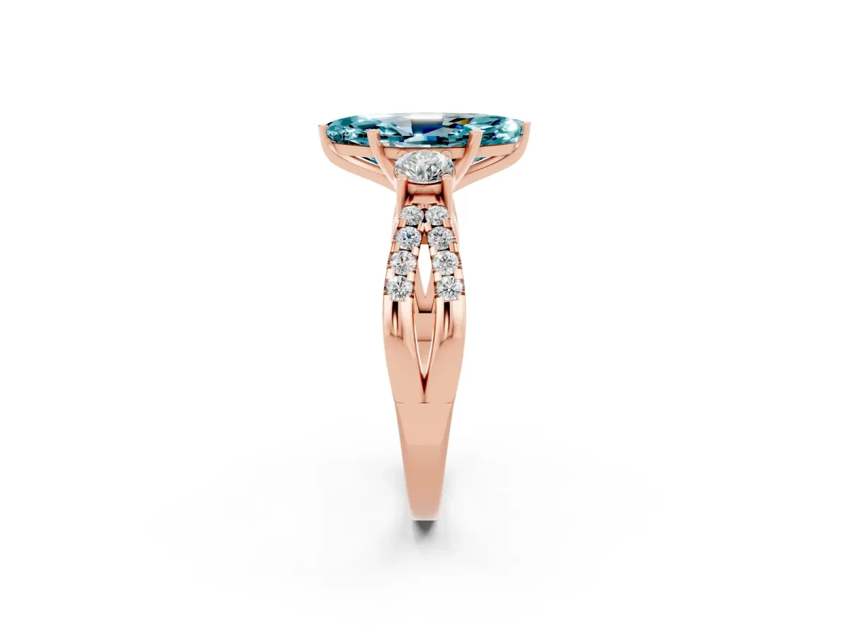 Marquise Cut Blue Topaz Three-Stone Ring with Pavé Split Shank and Four-Prong Setting Rose gold