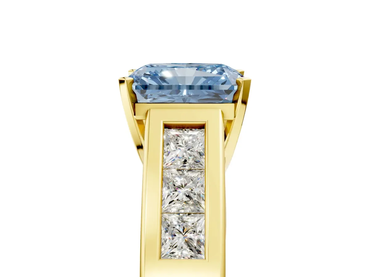 Fancy Blue Radiant Cut Cut Channel Set Solitaire Ring with Four-Prong Setting Yellow gold