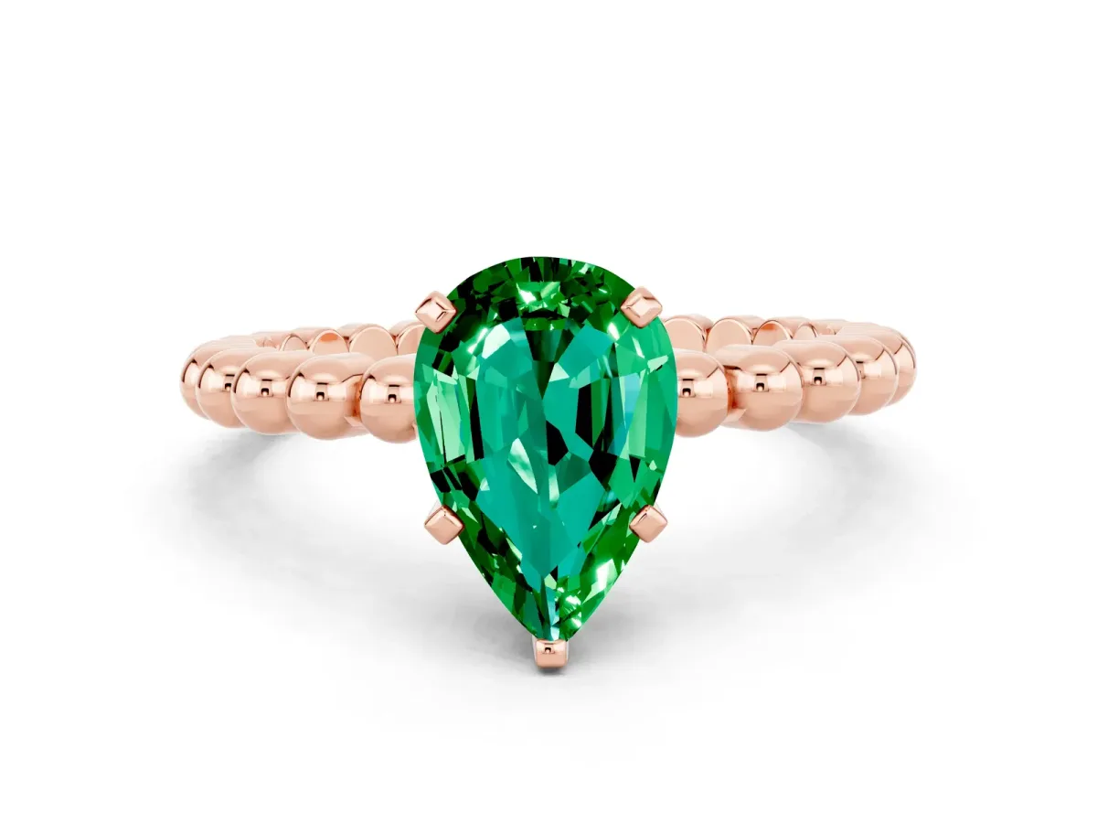 Pear Cut Emerald Solitaire Ring with Beaded Band and Prong Setting Rose gold