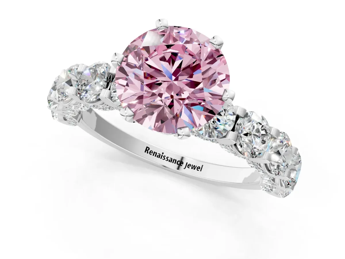 Fancy Pink Round Cut Diamond Side Stone Engagement Ring with Four-Prong Setting White gold
