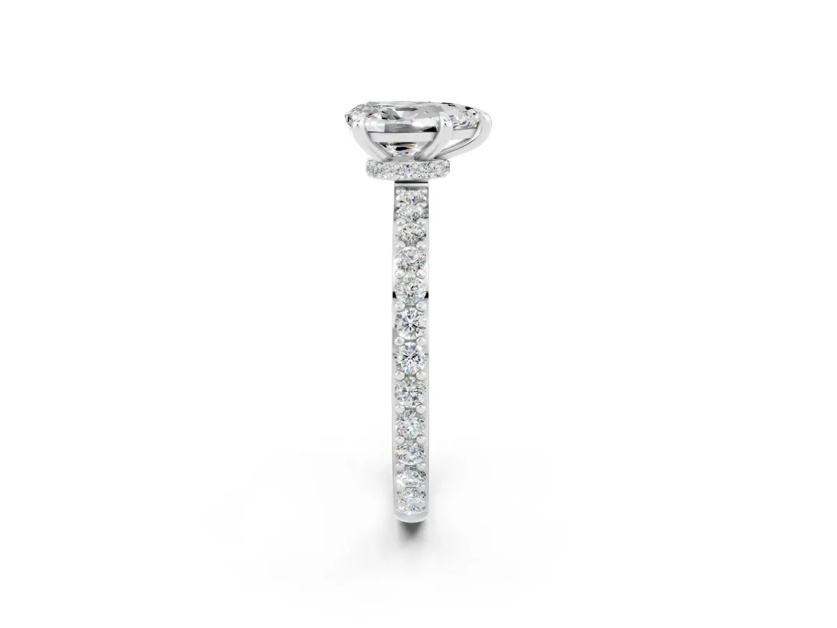 Pear Cut Moissanite Solitaire Engagement Ring with Pavé Band and Four-Prong Setting Silver