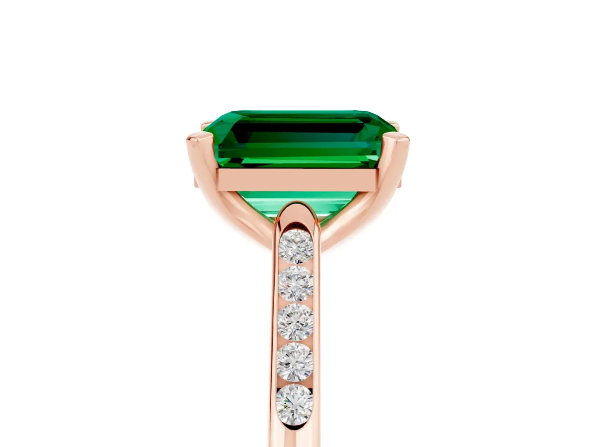 Emerald Cut Emerald Solitaire Ring with Channel Set Round Band and Prong Setting Rose gold