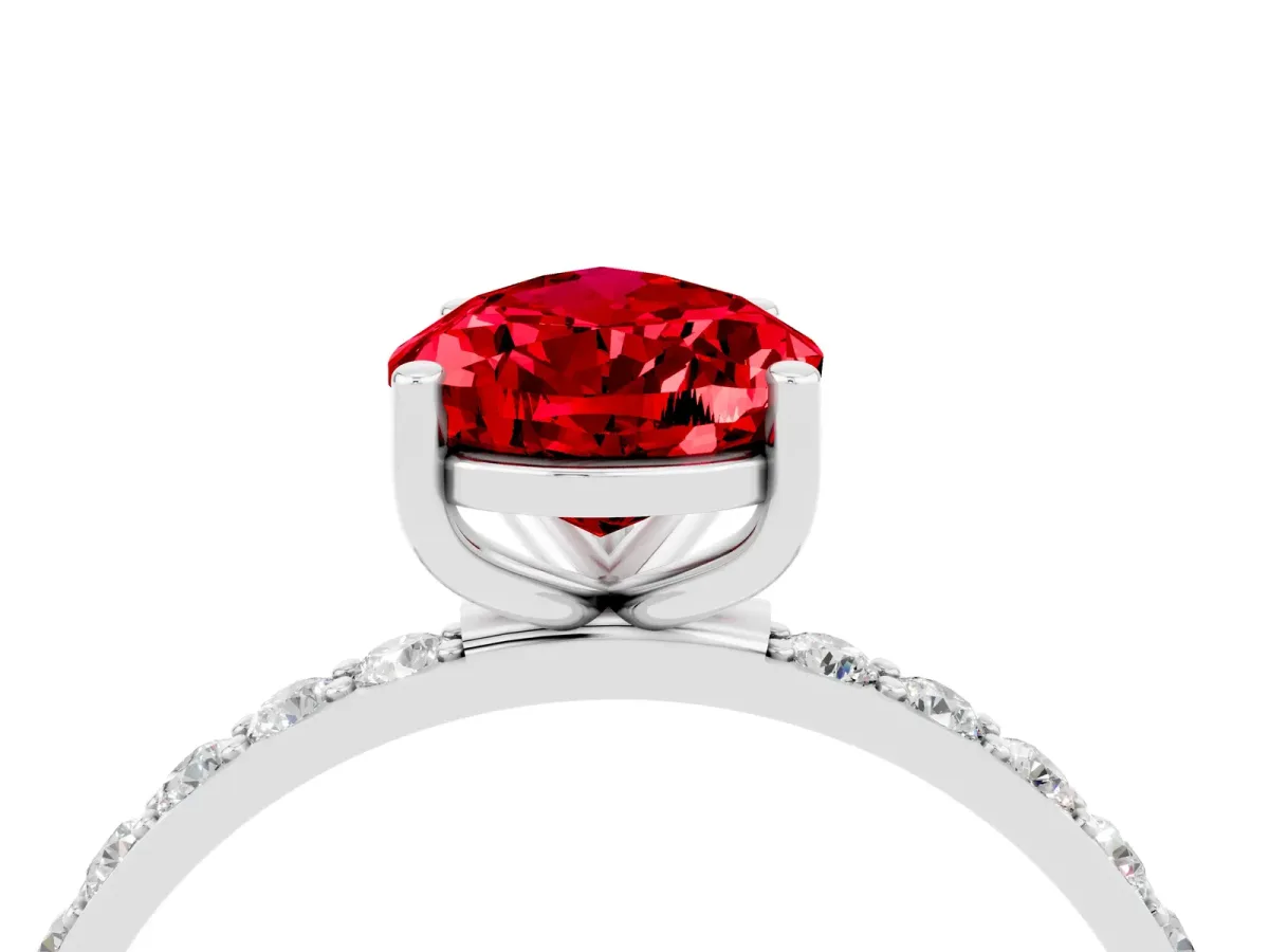 Pear Cut Ruby Solitaire Ring with Round Pavé Band and Prong Setting White gold