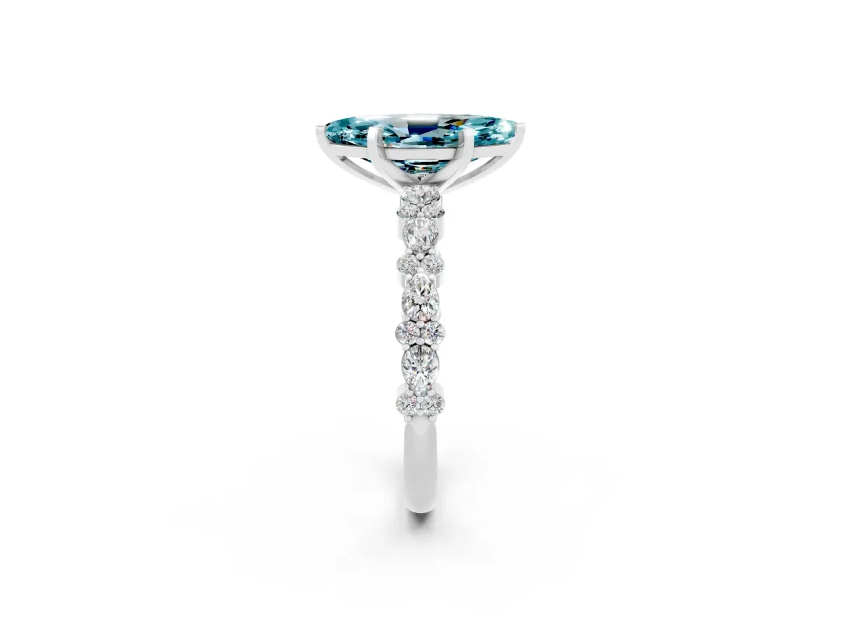 Marquise Cut Blue Topaz Side Stone Solitaire Ring with Round and Four-Prong Setting Silver