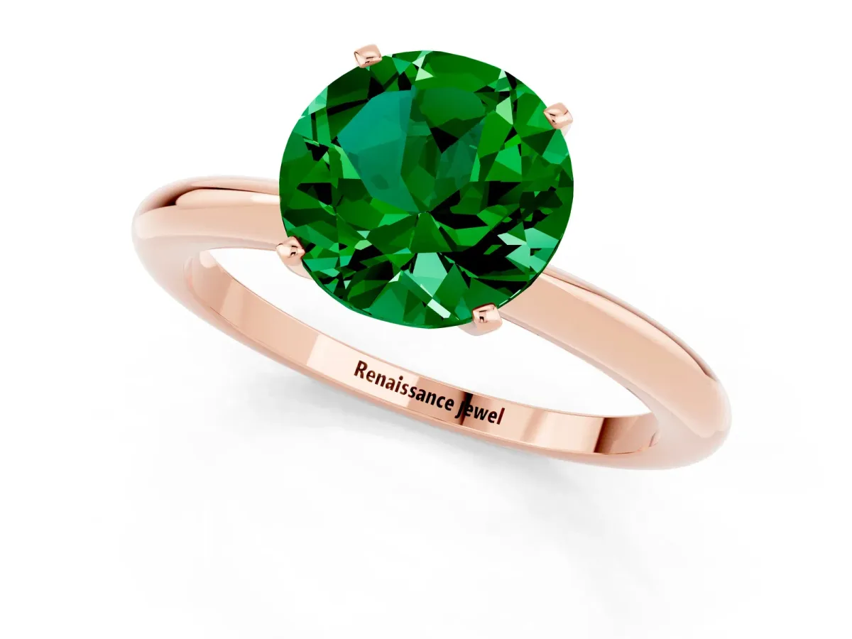 Round Cut Emerald Solitaire Ring with Six-Prong Setting and Classic Band Rose gold