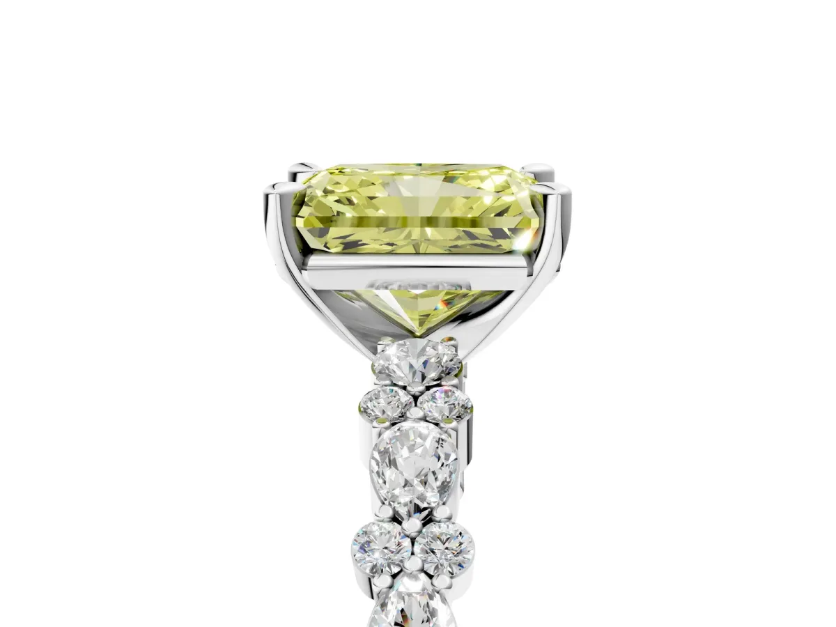 Fancy Yellow Radiant Cut Diamond Side Stone Solitaire Ring with Round and Four-Prong Setting Platinum