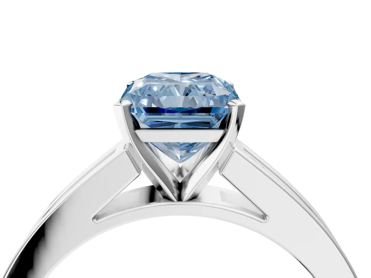 Fancy Blue Radiant Cut Solitaire Diamond Ring with Channel-Set Band and Four-Prong Setting Platinum
