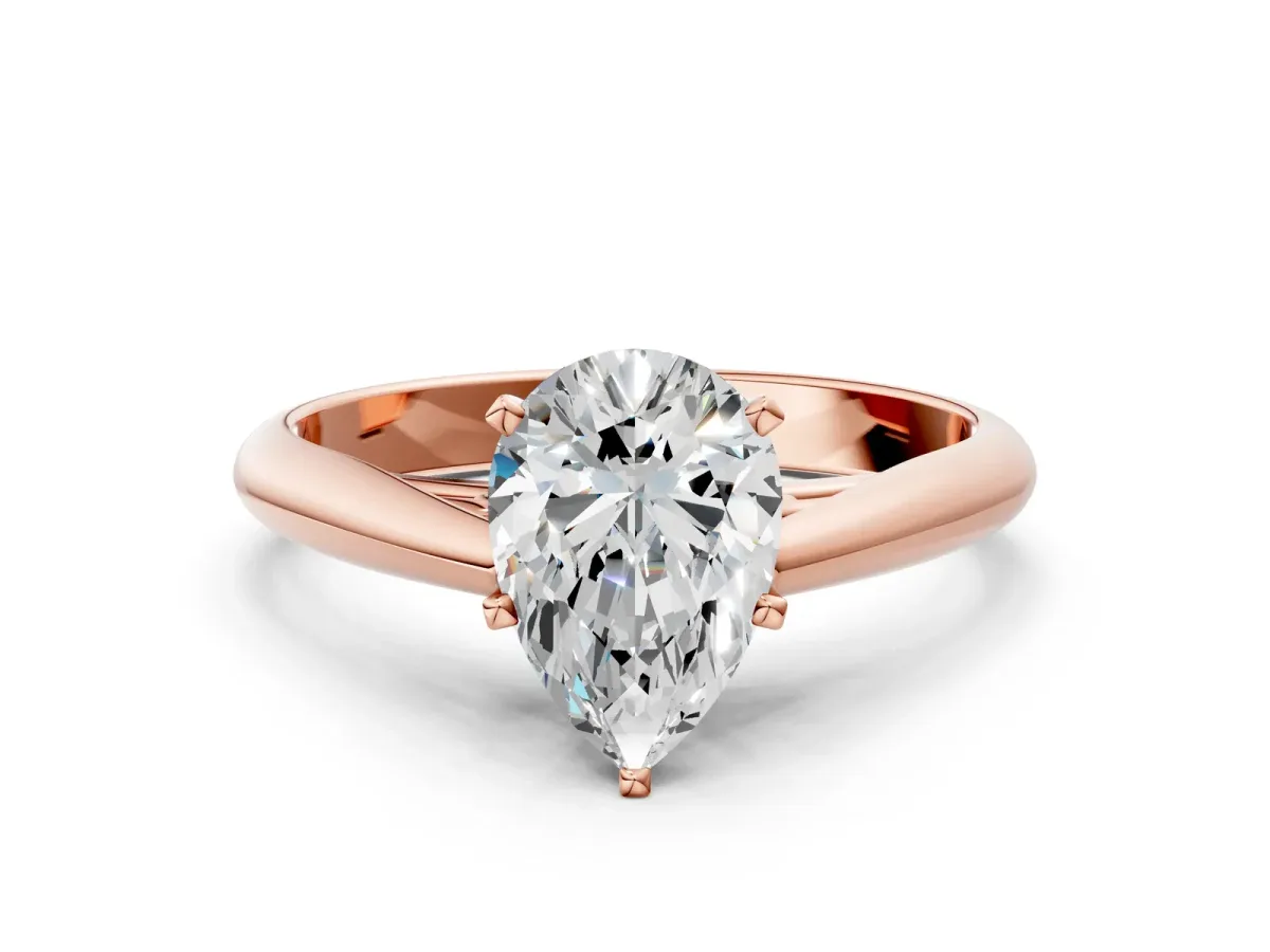 Pear Cut Diamond Solitaire Engagement Ring with Cathedral Setting and Four-Prong Mount Rose gold