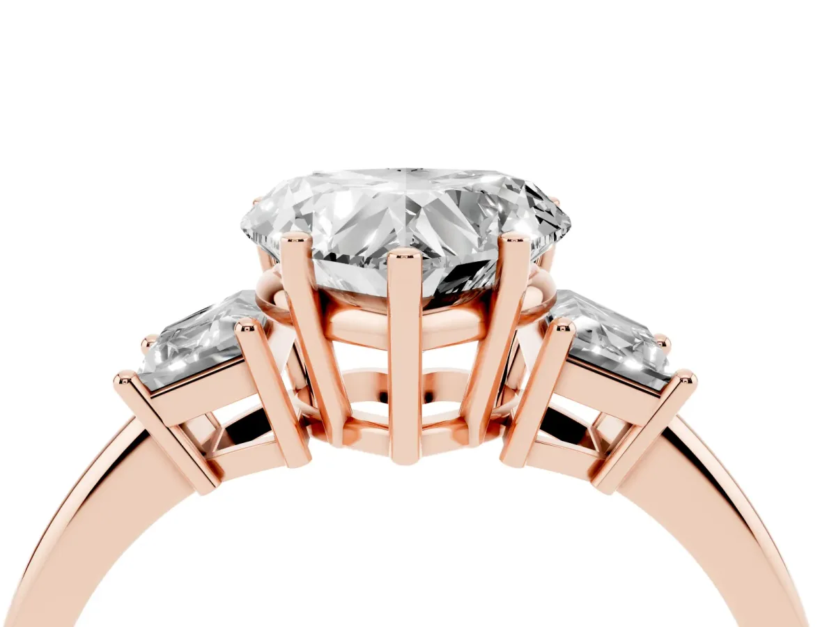 Heart Cut Diamond Three-Stone Ring with Trapezoid Side Stones and Prong Setting Rose gold