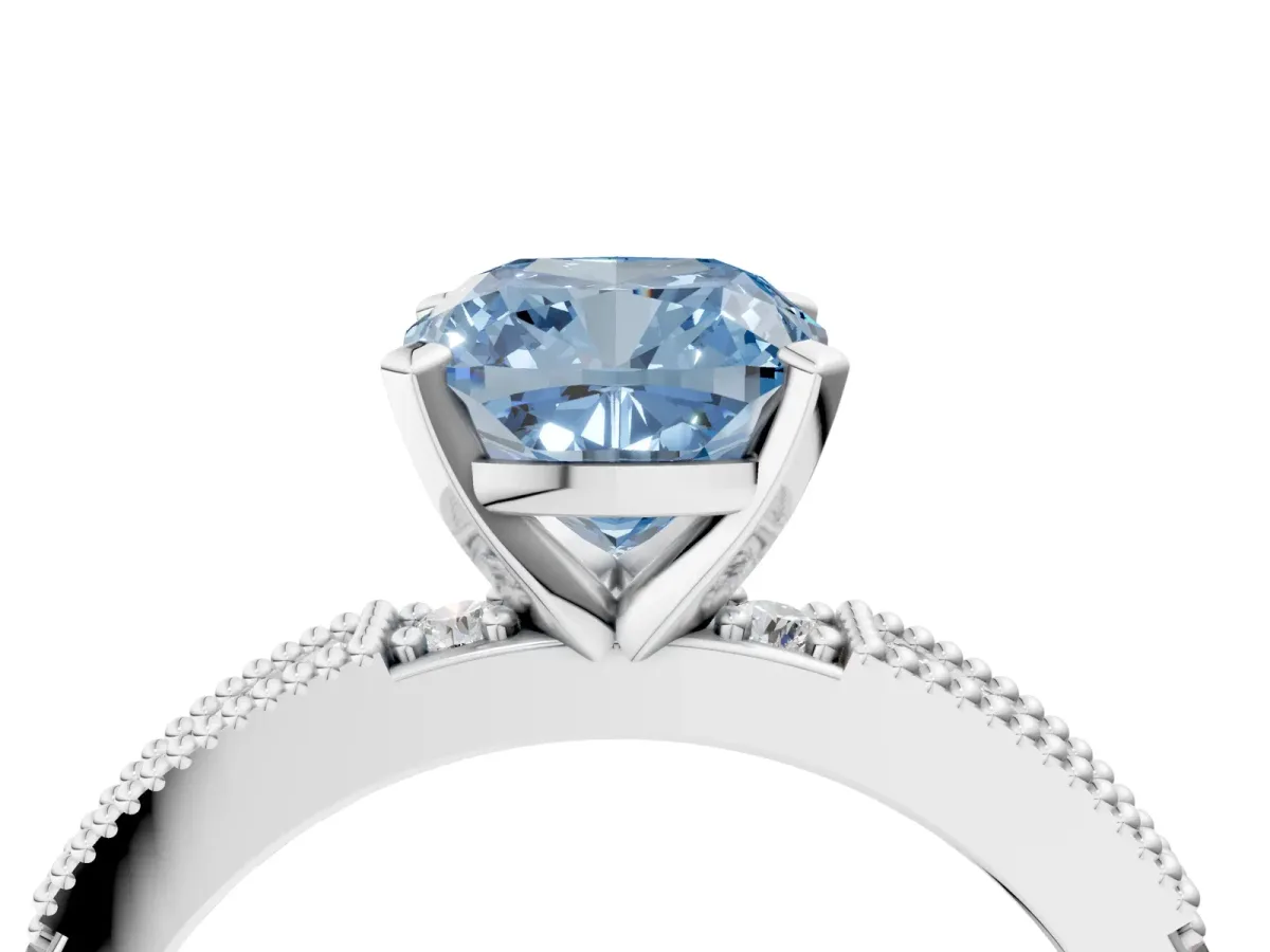 Fancy Blue Cushion Cut Solitaire with Pavé Band and Four-Prong Setting Silver