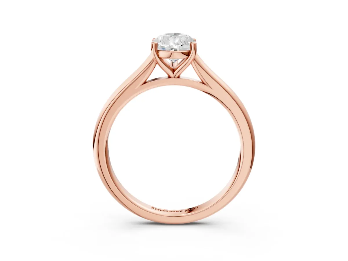Pear Cut Cut Solitaire Ring with Cathedral Band and Four-Prong Setting Rose gold