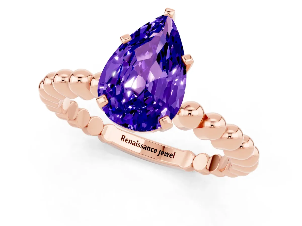 Pear Cut Tanzanite Solitaire Ring with Beaded Band and Prong Setting Rose gold