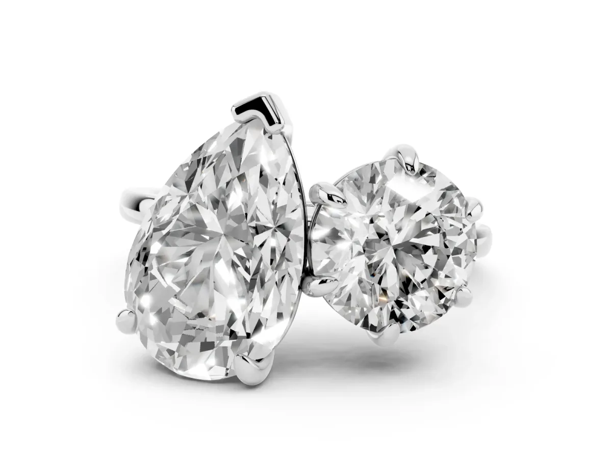 Round and Pear Toi Moi Ring with Prong Setting and Plain Band Silver