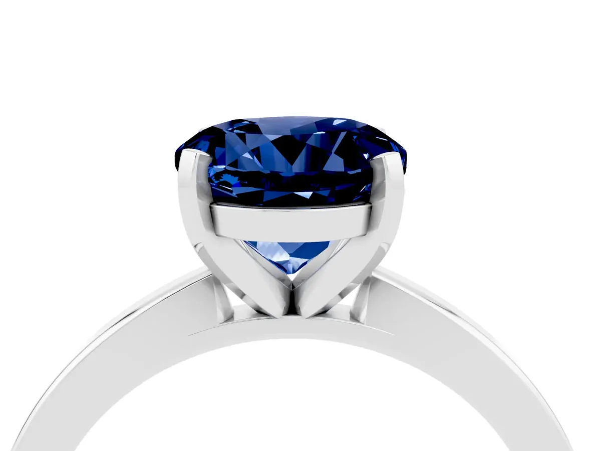 Round Cut Blue Sapphire Solitaire Engagement Ring with Classic Band and Four-Prong Setting Silver