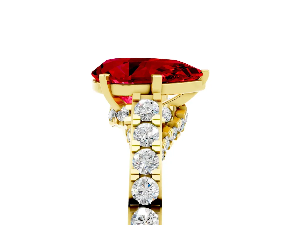 Pear Cut Ruby Solitaire Ring with Crossover Gallery and Round Pavé Band Yellow gold