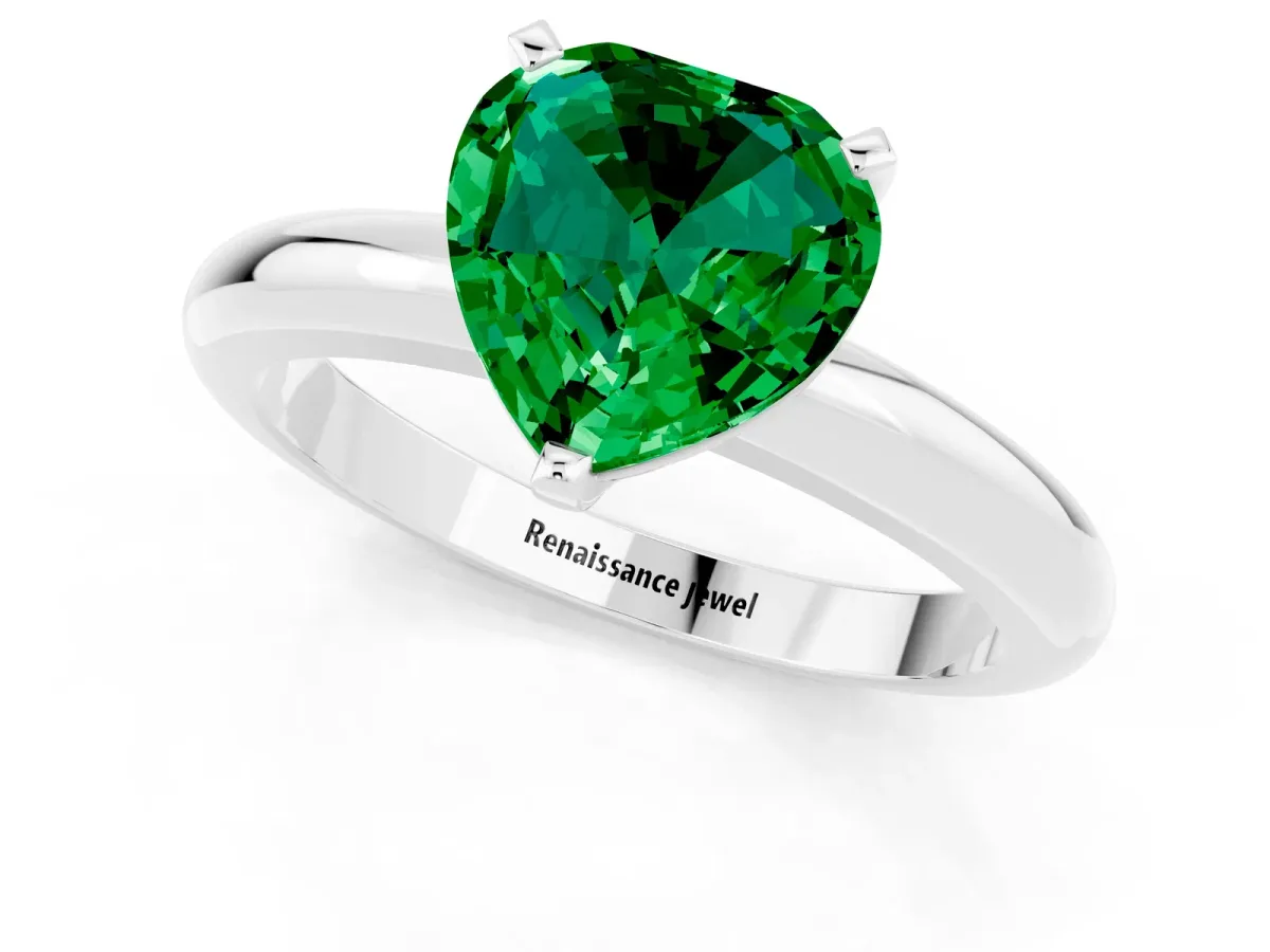 Heart Cut Emerald Solitaire Engagement Ring with Round Band and Four-Prong Setting Silver