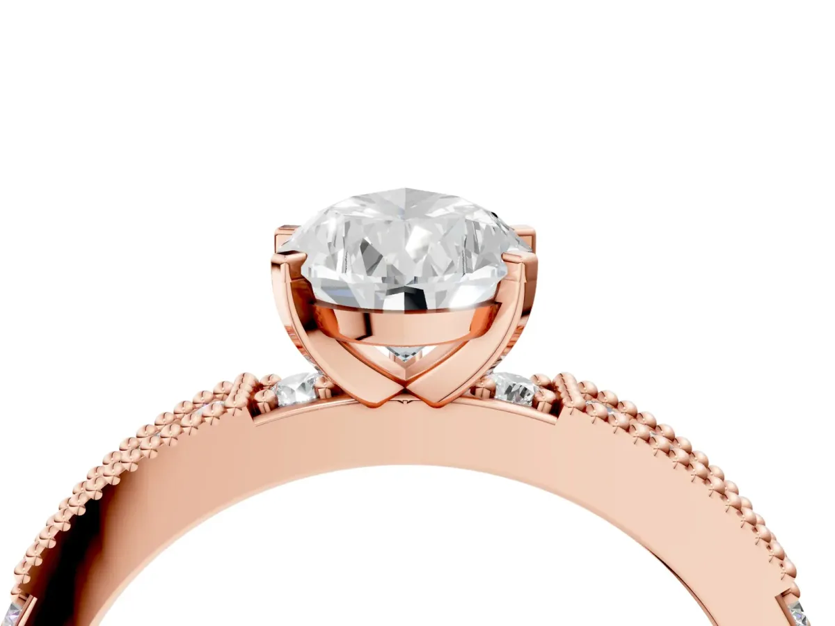 Pear Cut Solitaire with Pavé Band and Four-Prong Setting Rose gold