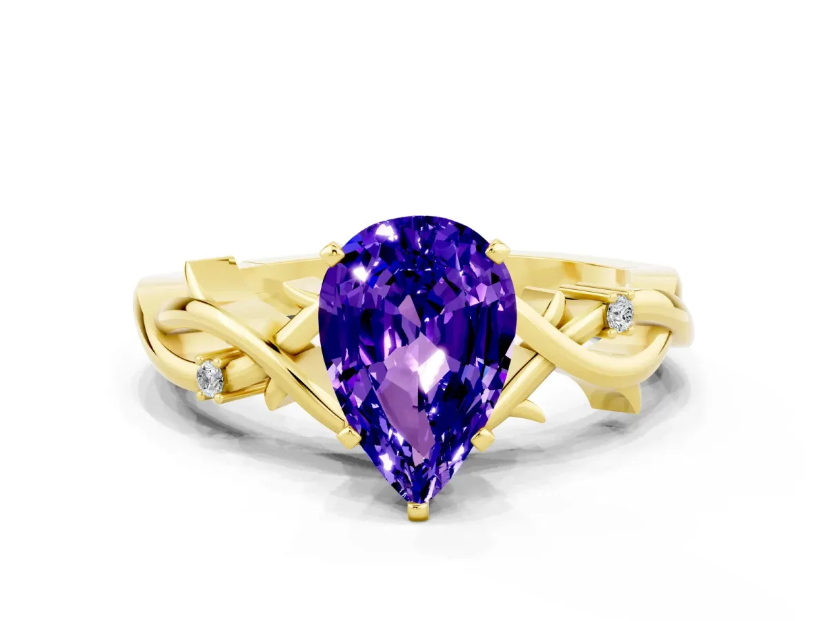 Pear Cut Tanzanite Solitaire Ring with Twisted Band and Prong Setting Yellow gold