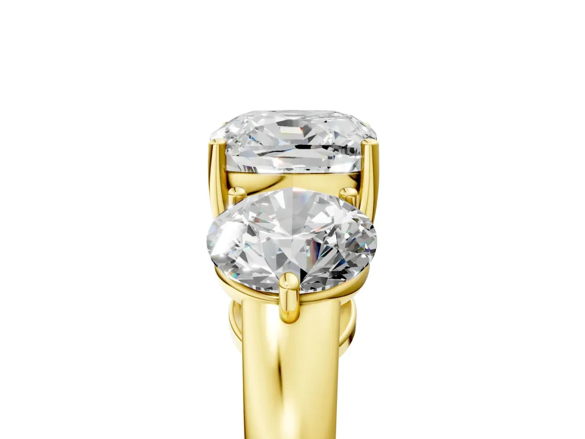 Cushion Cut Diamond Three-Stone Ring with Prong Setting and Classic Band Yellow gold