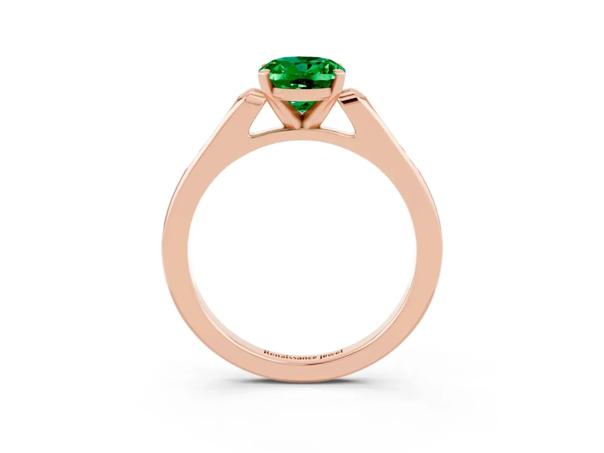Oval Cut Emerald Solitaire Ring with Channel Set Round Band and Prong Setting Rose gold