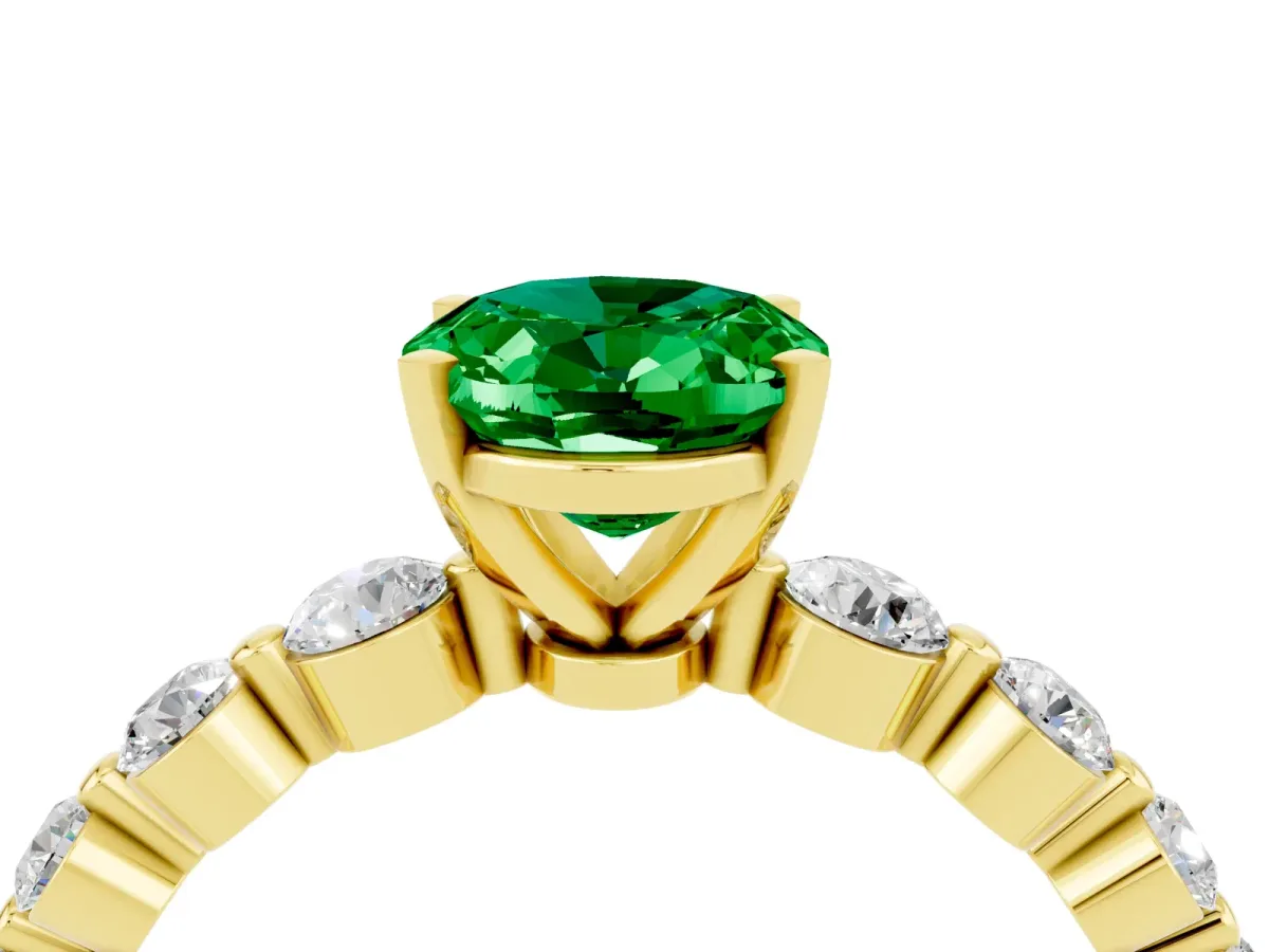 Oval Cut Solitaire Emerald Ring with Pave Band and Four-Prong Setting Yellow gold