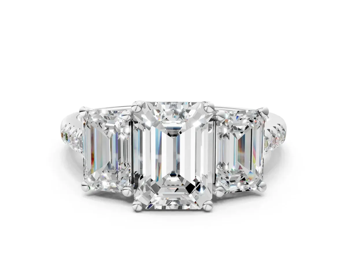 Three-Stone Emerald Cut Diamond Ring with Round Pavé Band and Prong Setting Platinum